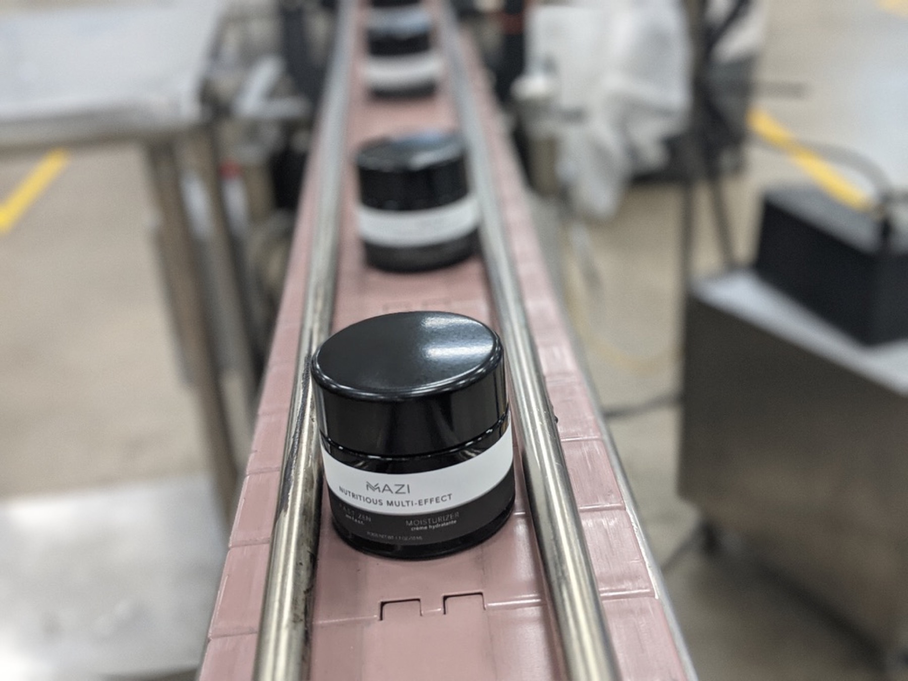 Mazi Beauty jars on the line in the group's own plant.